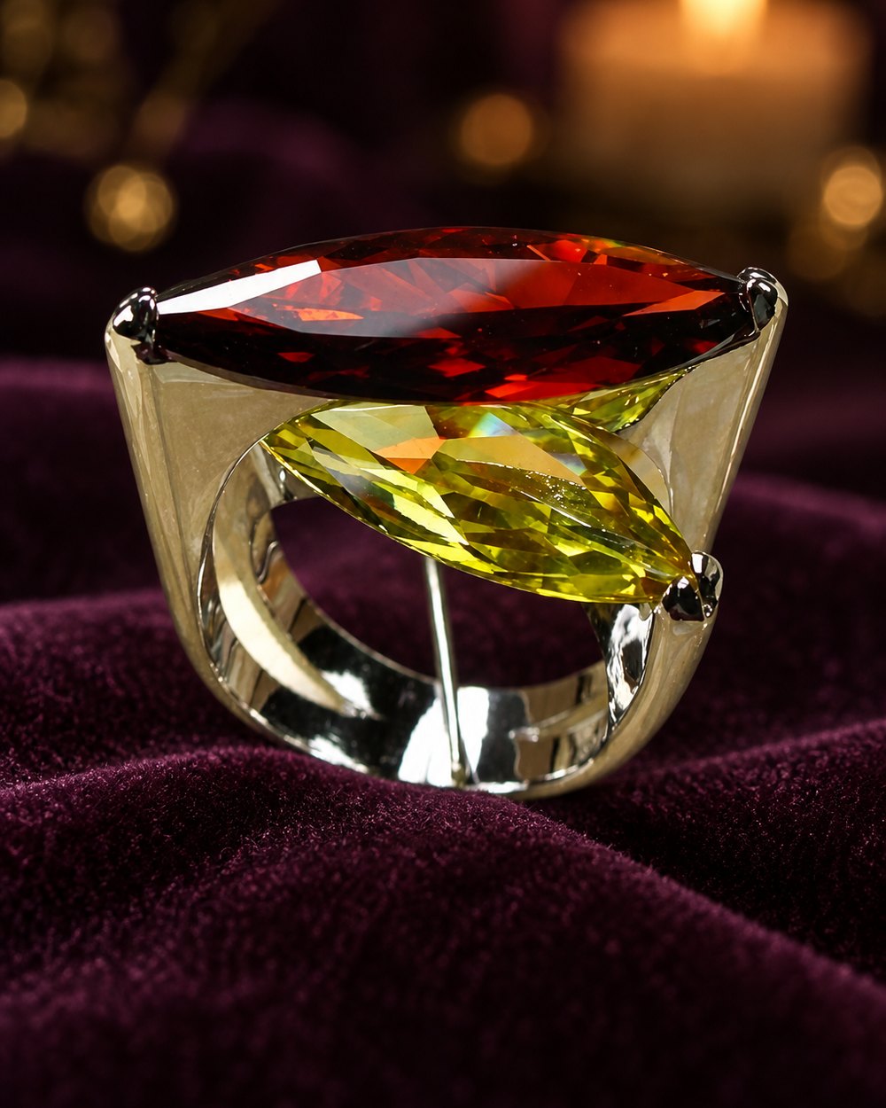 Garnet and citrine marquise ring in sterling silver, standing on velvet