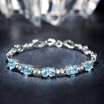Sterling Silver Blue Topaz Charm BraceletBracelet