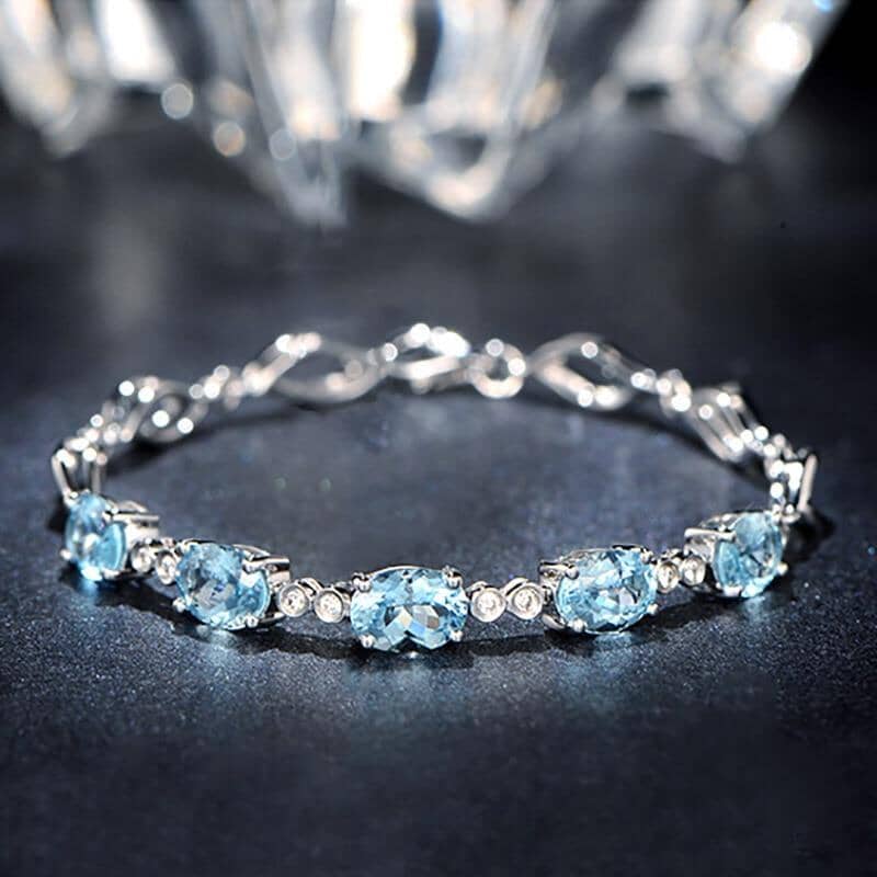 Sterling Silver Blue Topaz Charm BraceletBracelet