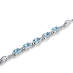 Sterling Silver Blue Topaz Charm BraceletBracelet