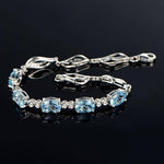 Sterling Silver Blue Topaz Charm BraceletBracelet