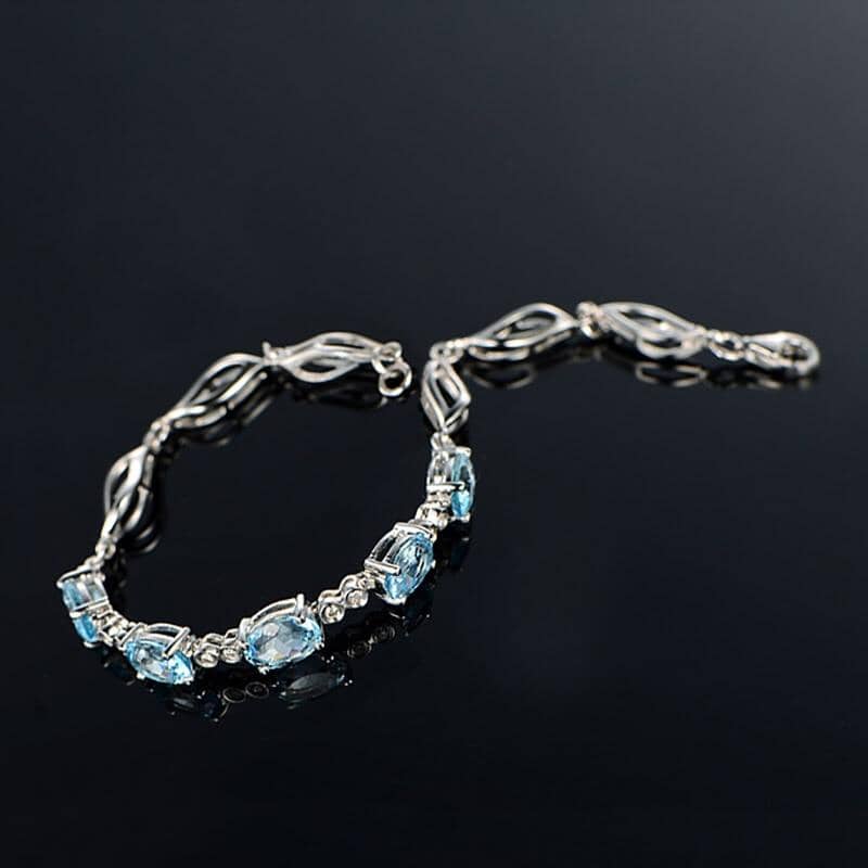 Sterling Silver Blue Topaz Charm BraceletBracelet