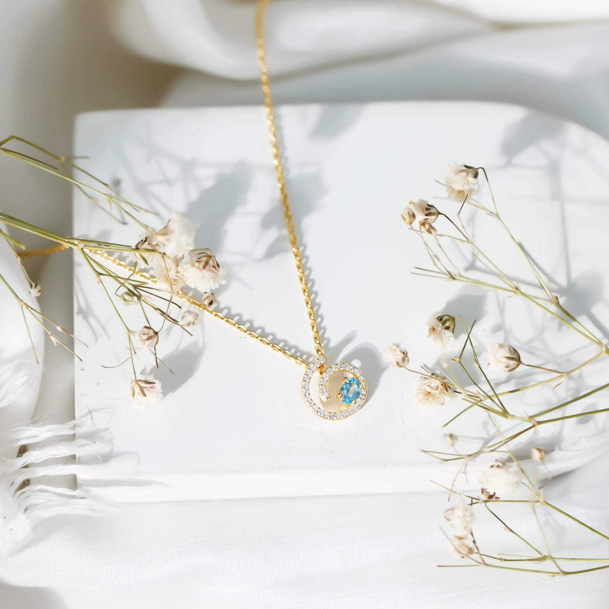 Genuine Sky Blue Topaz and Diamond Swirl Necklace with Silver ChainPendants