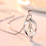 Gyrate Pearl Pendants And Necklaces