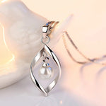 Gyrate Pearl Pendants And Necklaces