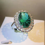 Oval Firework Craft 925 silver Inlaid Emerald Sense four-claw Ring