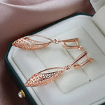 Gold Ethnic Hollow Geometric Oval Dangle Earrings