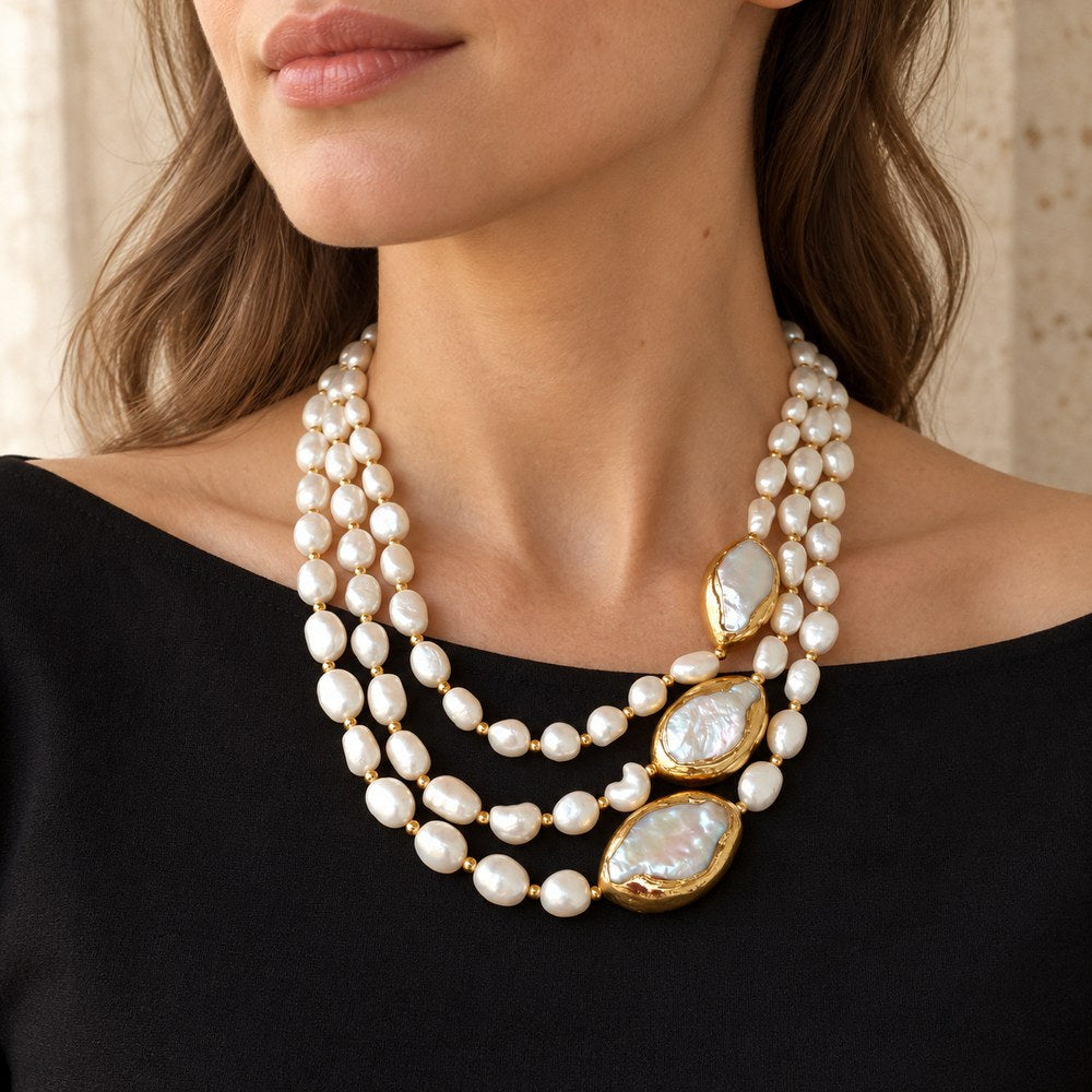 3-Row Baroque Pearl Necklace worn just below a woman's collarbone