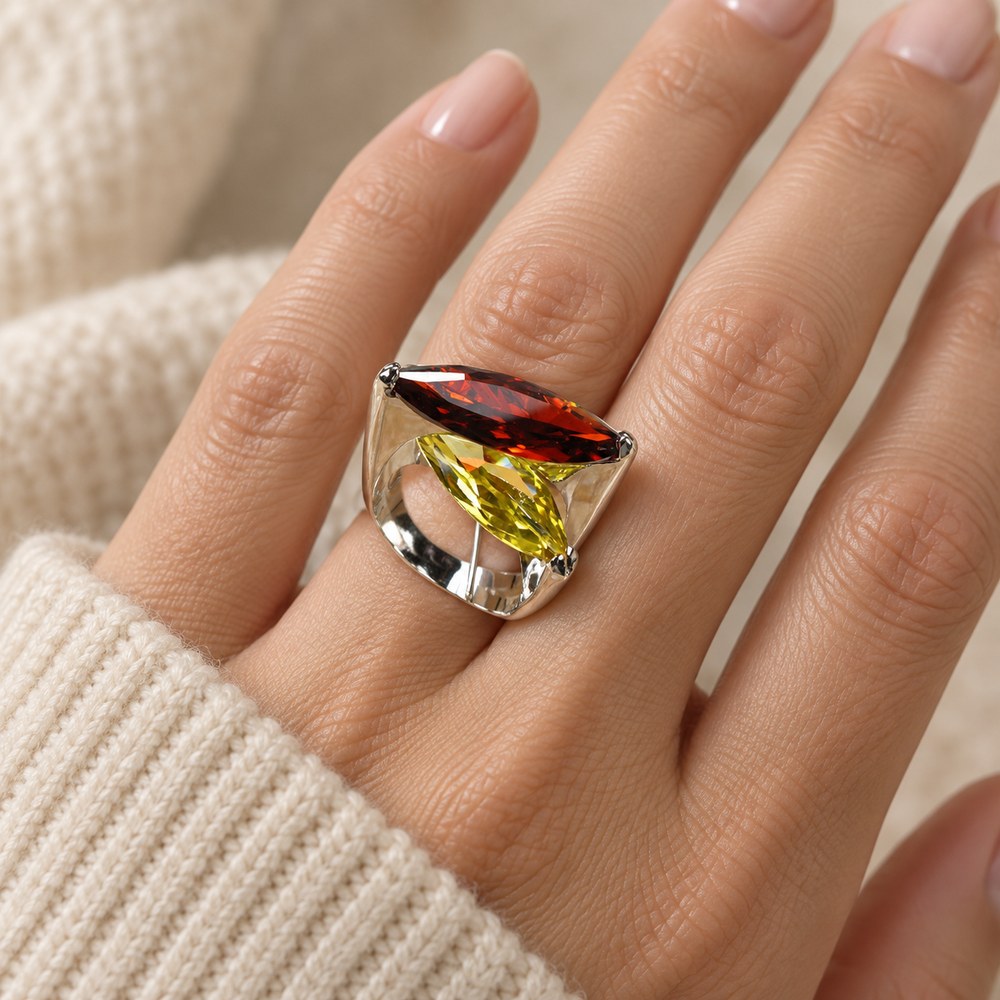 Garnet & Citrine Marquise Ring worn on a woman's finger