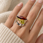 Garnet & Citrine Marquise Ring worn on a woman's finger