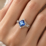 Princess Cut Lab Sapphire Ring worn on a woman's finger