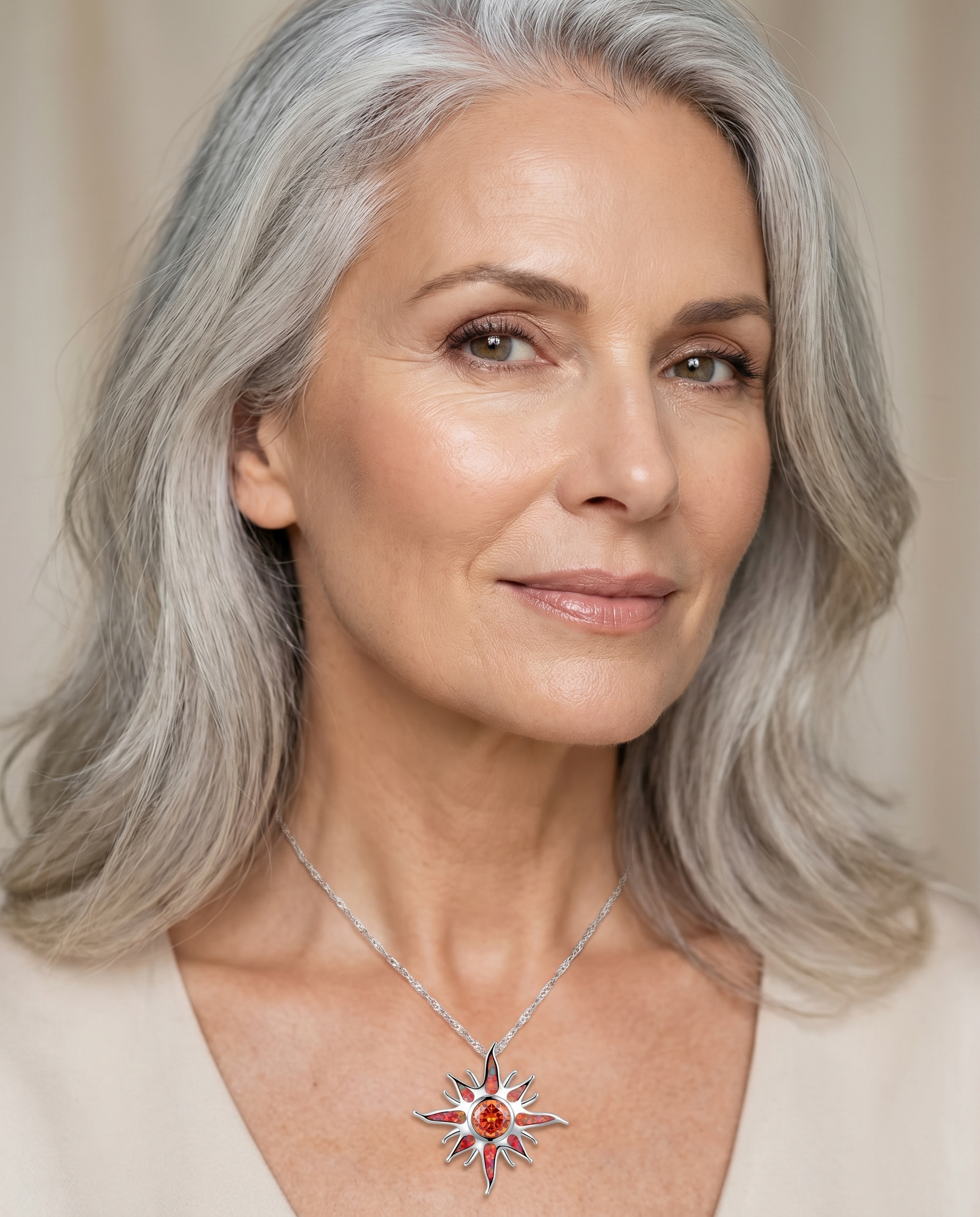 Elegant woman wearing the Orange Fire Opal Pendant - AtPerry's