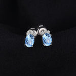Crown 1ct Oval Natural Sky Blue Topaz Stud Earrings - 925 Sterling Silver