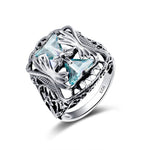 Petals Blue Triangle Aquamarine Ring